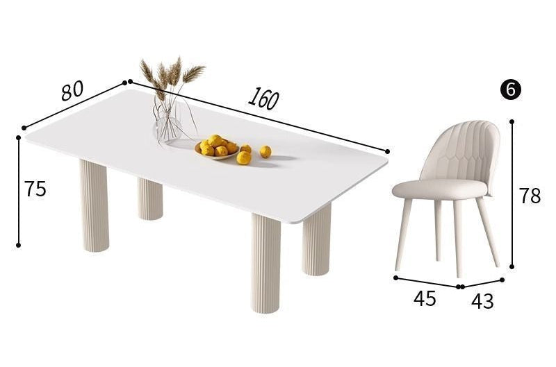 White rectangular dining table with ribbed cylindrical legs shown alongside a matching upholstered chair on a light gray background, with dimension labels