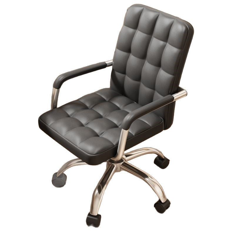 A black faux leather office chair with a tufted grid pattern on the seat and backrest, featuring chrome-finished armrests and a five-star wheeled base.