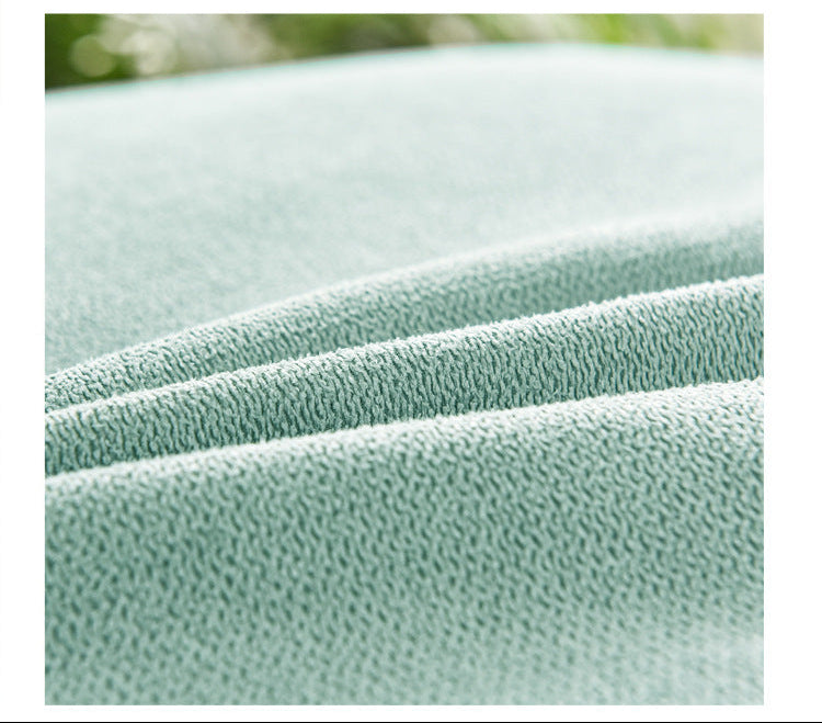 Close-up of a soft mint green fabric texture 